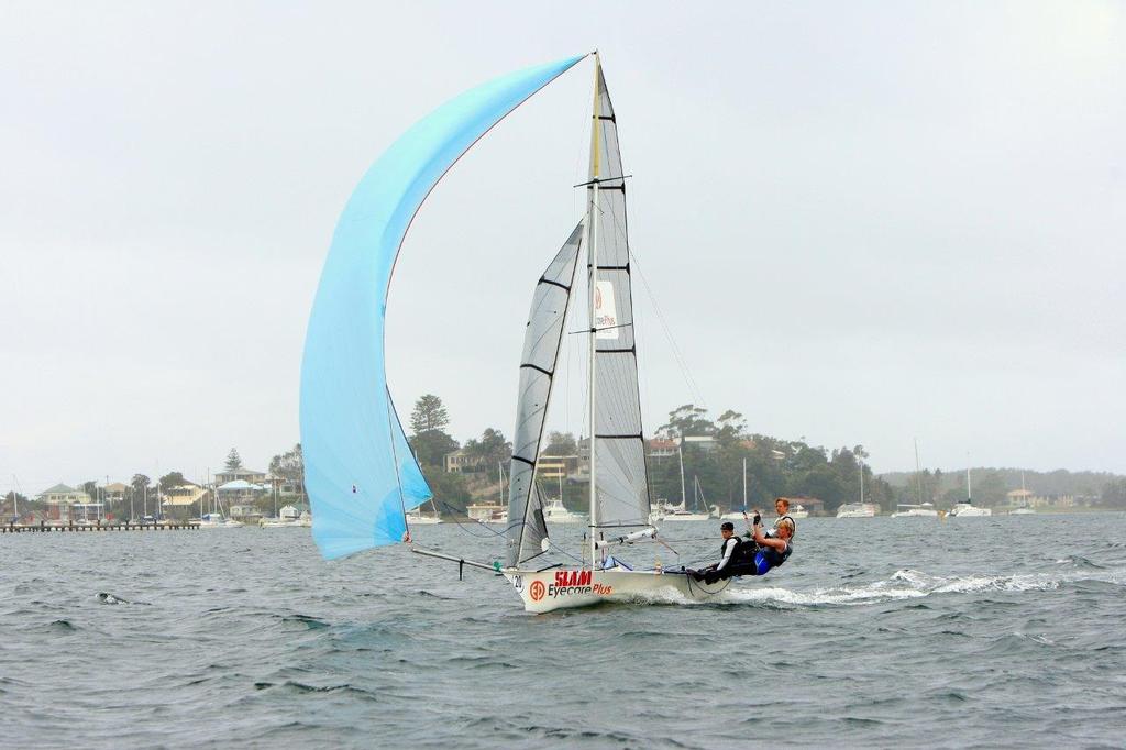 'EyecarePlus' Harry Lawson 16ft Skiff on their way to a win in Race 6. © Chris Munro